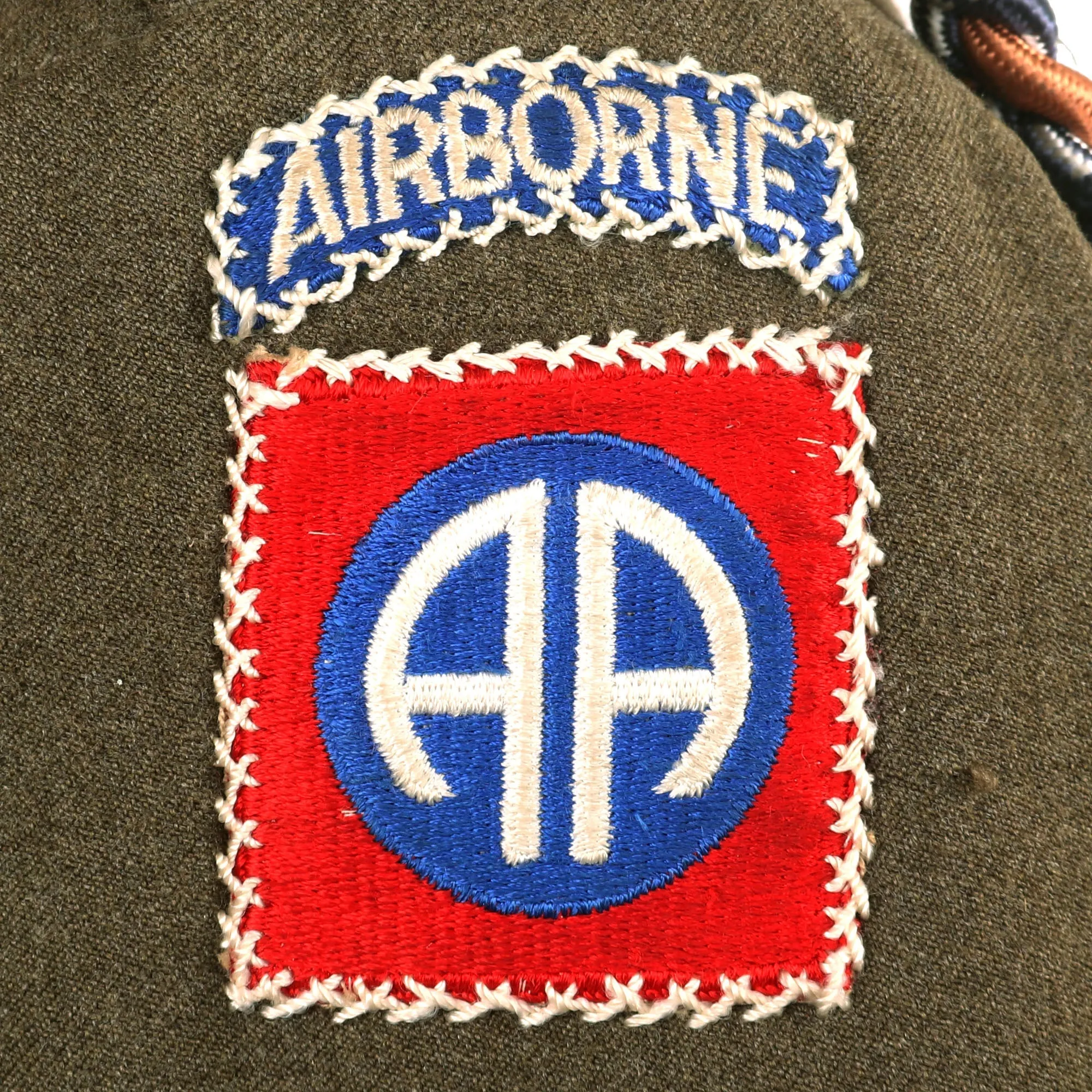 Original U.S. WWII Named 82nd Airborne Division Headquarters Ike Jacket with DUI on Shoulder Boards